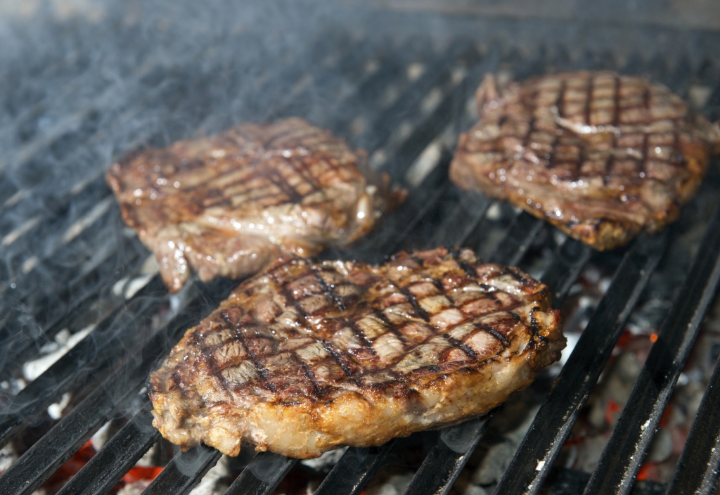 beef steak cooking on an open flame grill Texas Steaks Steaks, Gifts